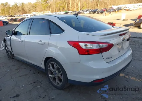 2012 Ford Focus Titanium z USA, uszkodzony, nr VIN 1FAHP3J20CL428059